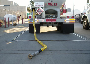 Truck with coil hose protection